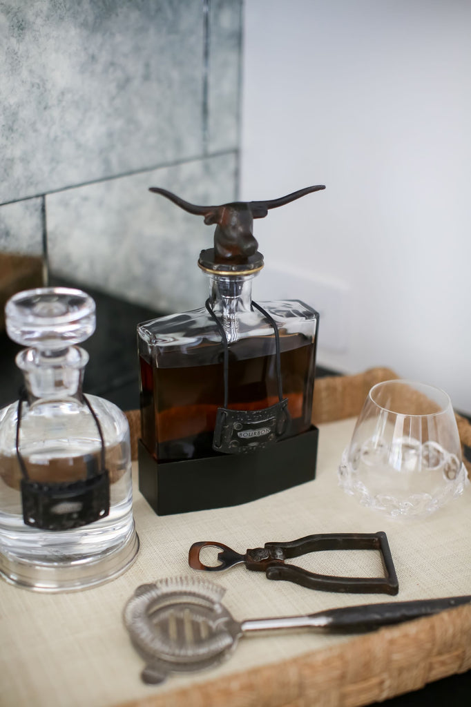Longhorn Decanter with Clear Glass and Iron Base Styled in Home
