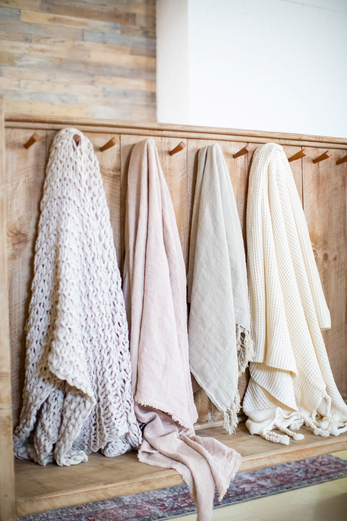 Ivory Waffle Texture Throw with Tassels Styled on Hooks